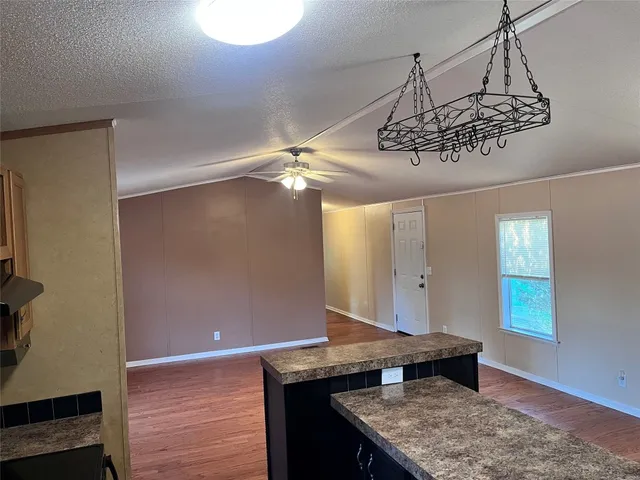 a room with a table and chairs