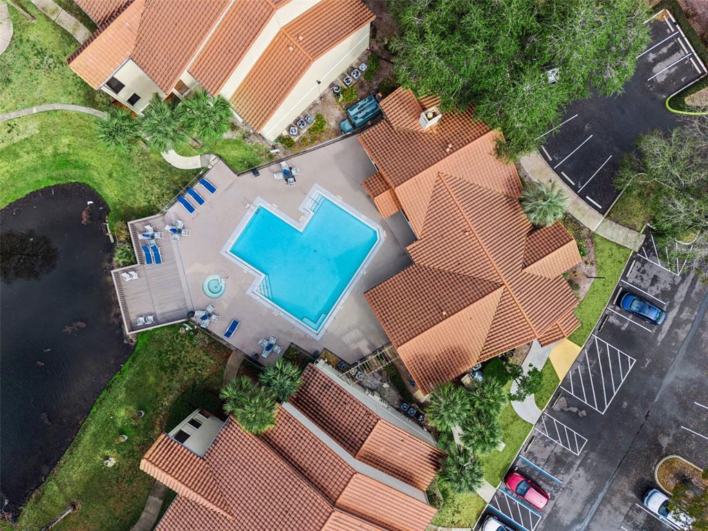 3032 Parkway Boulevard, Unit 305 Kissimmee, FL 34747 - Photo 40 of 40 an aerial view of a house with a garden