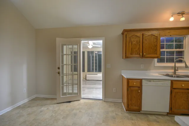 a view of a workspace with furniture