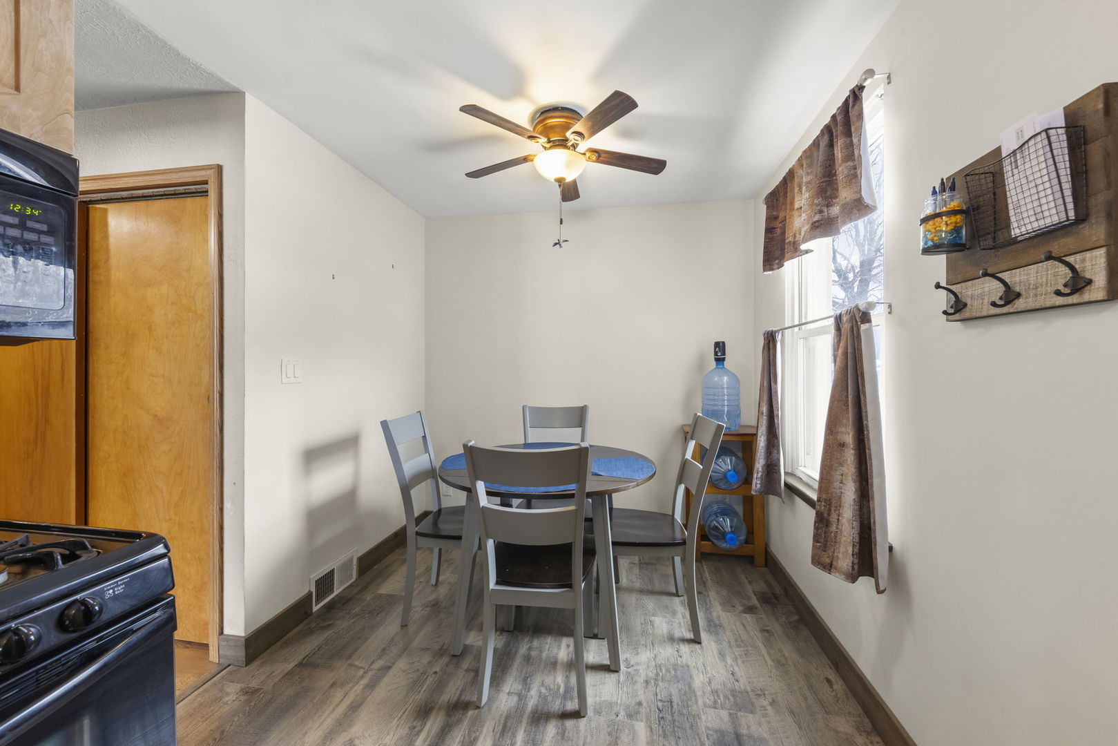 2145 Root Street Crest Hill, IL 60403 - Photo 11 of 34 a work room with furniture and wooden floor