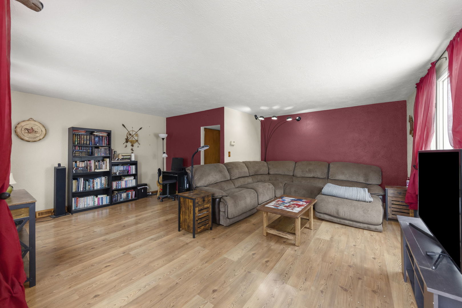 2145 Root Street Crest Hill, IL 60403 - Photo 4 of 34 a living room with furniture and a flat screen tv