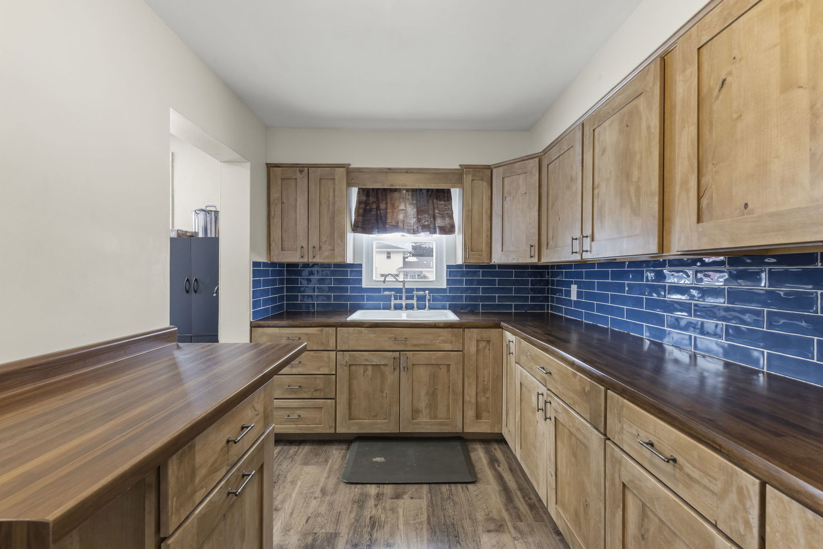 2145 Root Street Crest Hill, IL 60403 - Photo 10 of 34 a kitchen with stainless steel appliances granite countertop a sink stove and cabinets