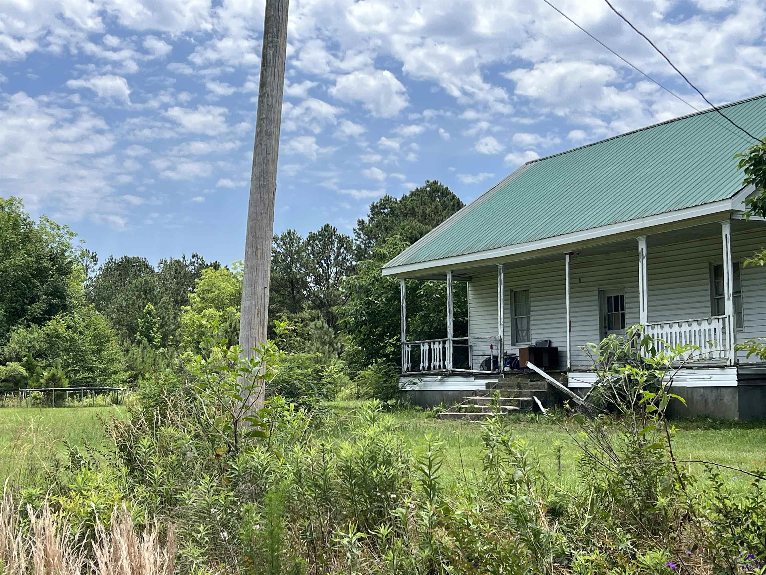Rock Hill Road Cochran, GA 31014 - Photo 20 of 26 a view of house with backyard and garden