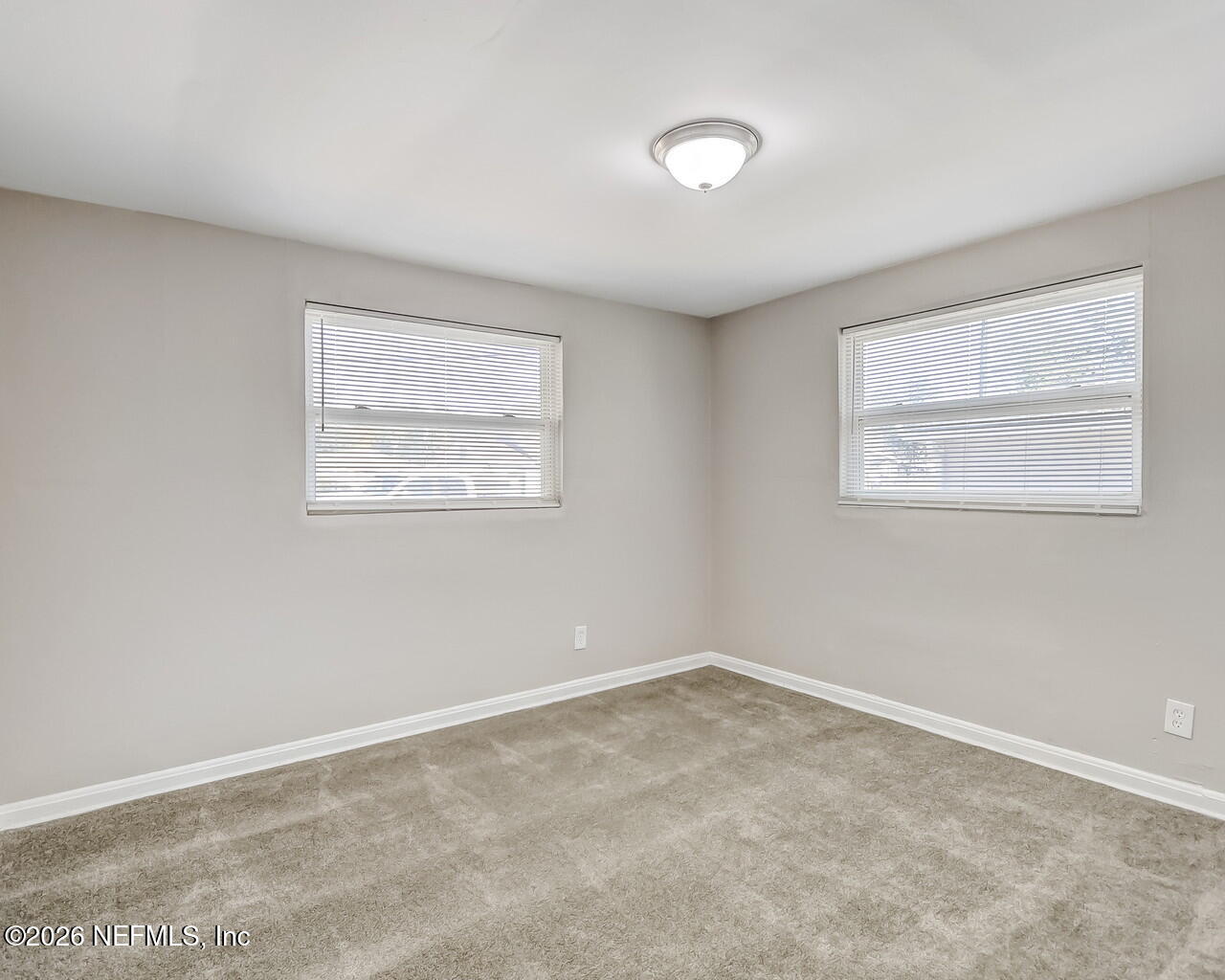 2140 Jayson Avenue Jacksonville, FL 32208 - Photo 20 of 34 an empty room with windows