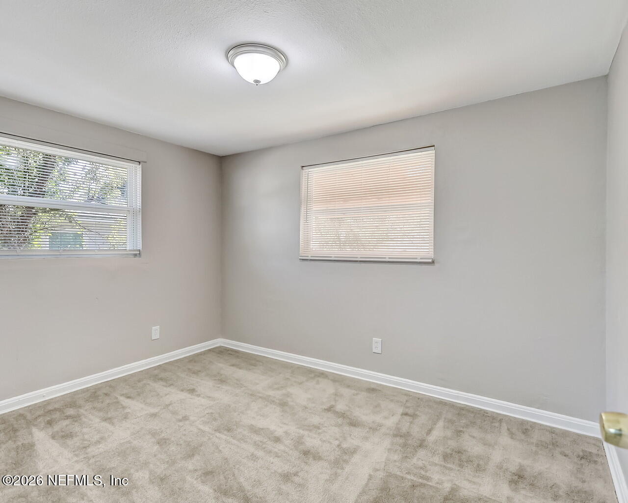 2140 Jayson Avenue Jacksonville, FL 32208 - Photo 23 of 34 an empty room with a window