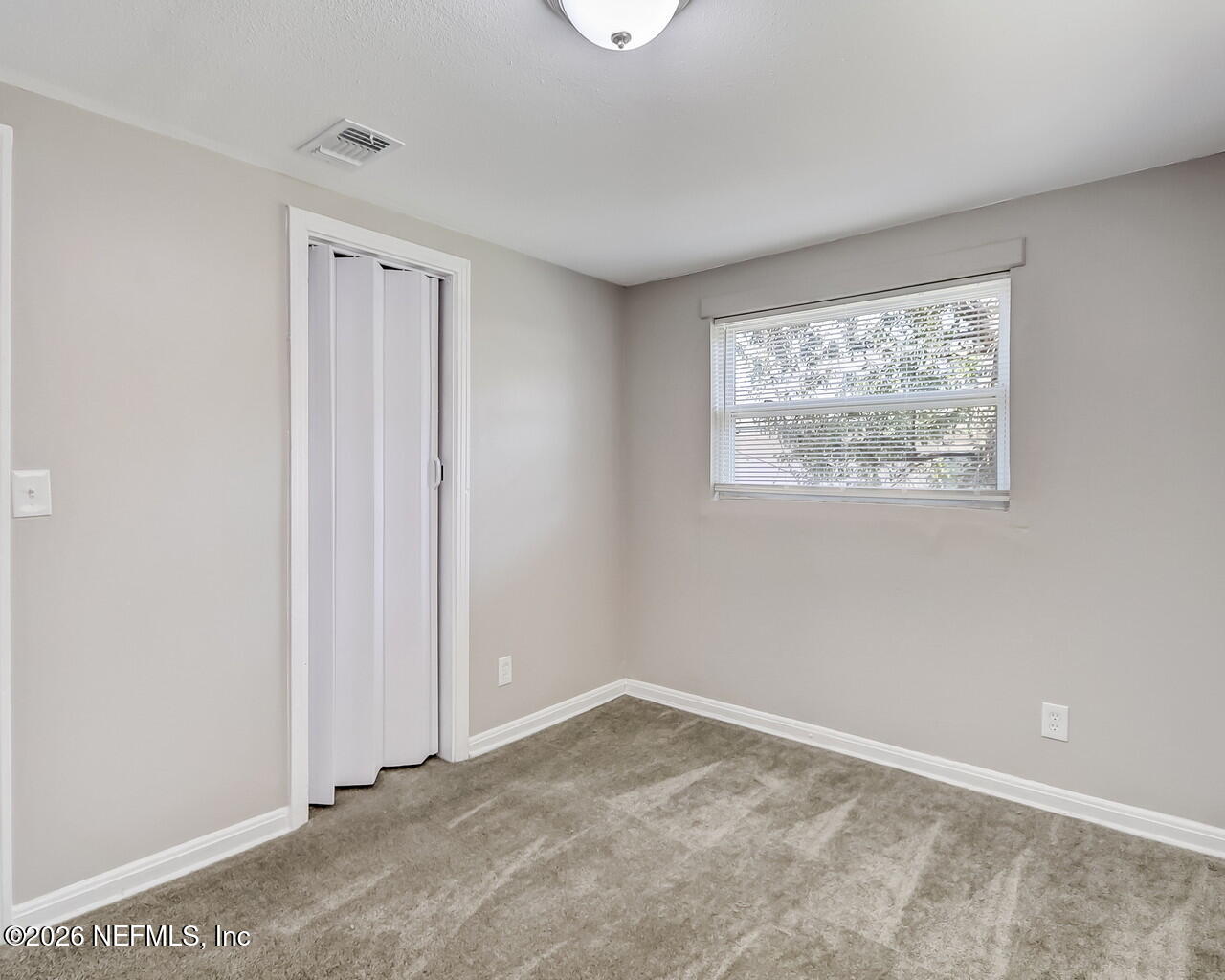 2140 Jayson Avenue Jacksonville, FL 32208 - Photo 24 of 34 a view of an empty room with a window