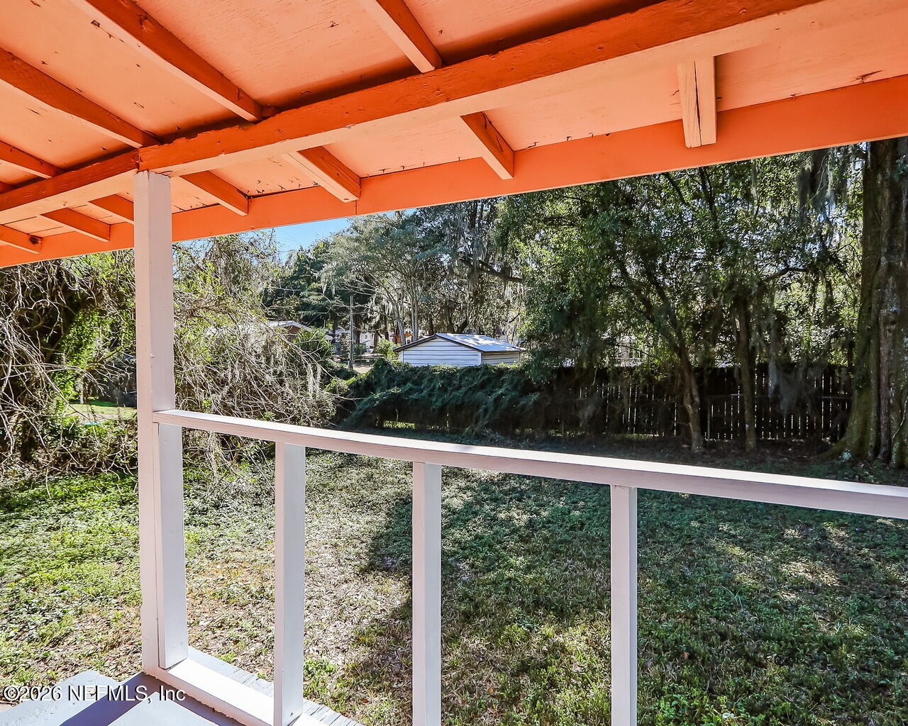 2140 Jayson Avenue Jacksonville, FL 32208 - Photo 28 of 34 a view of a yard with a street from a window