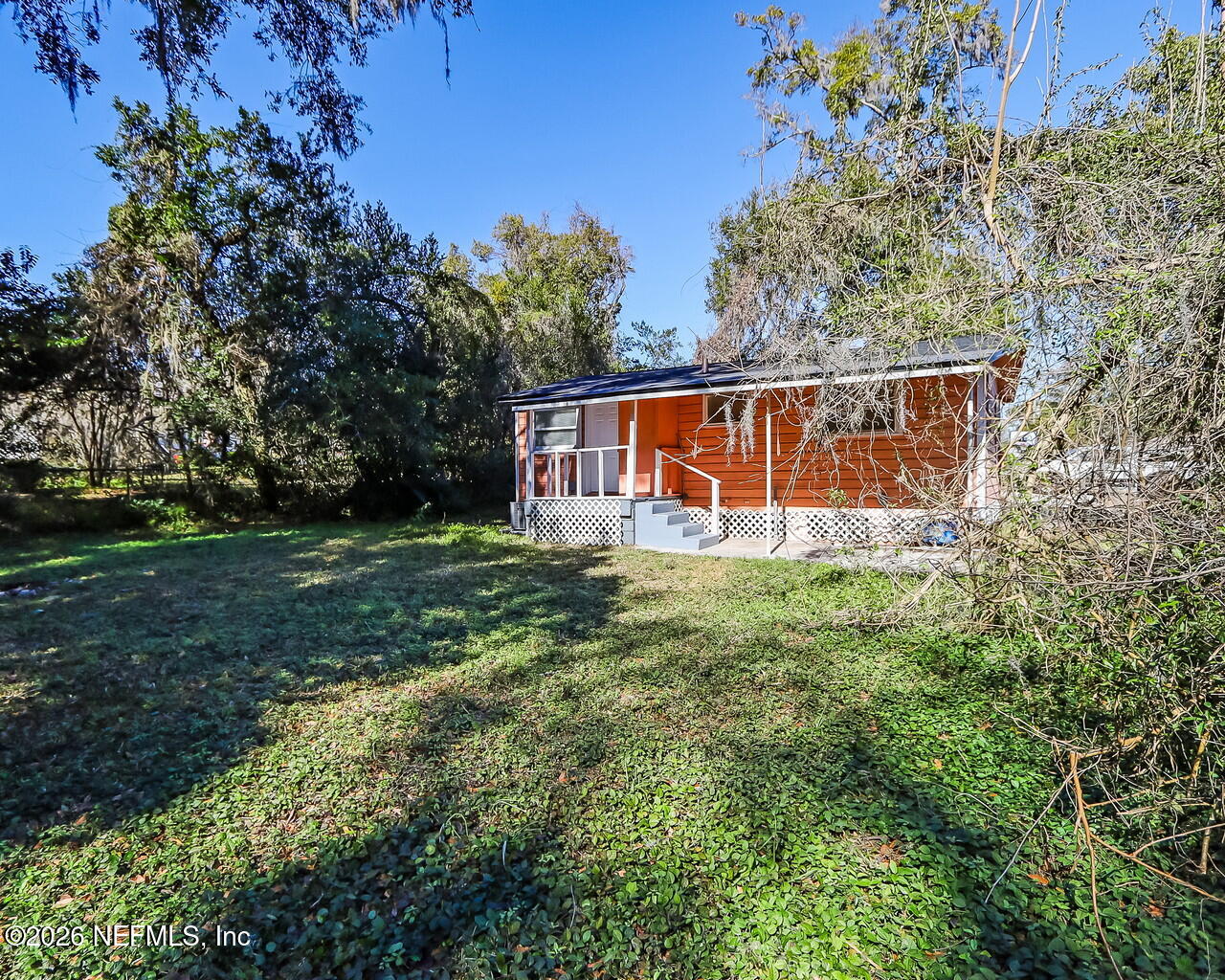 2140 Jayson Avenue Jacksonville, FL 32208 - Photo 34 of 34 a view of an house with backyard and garden