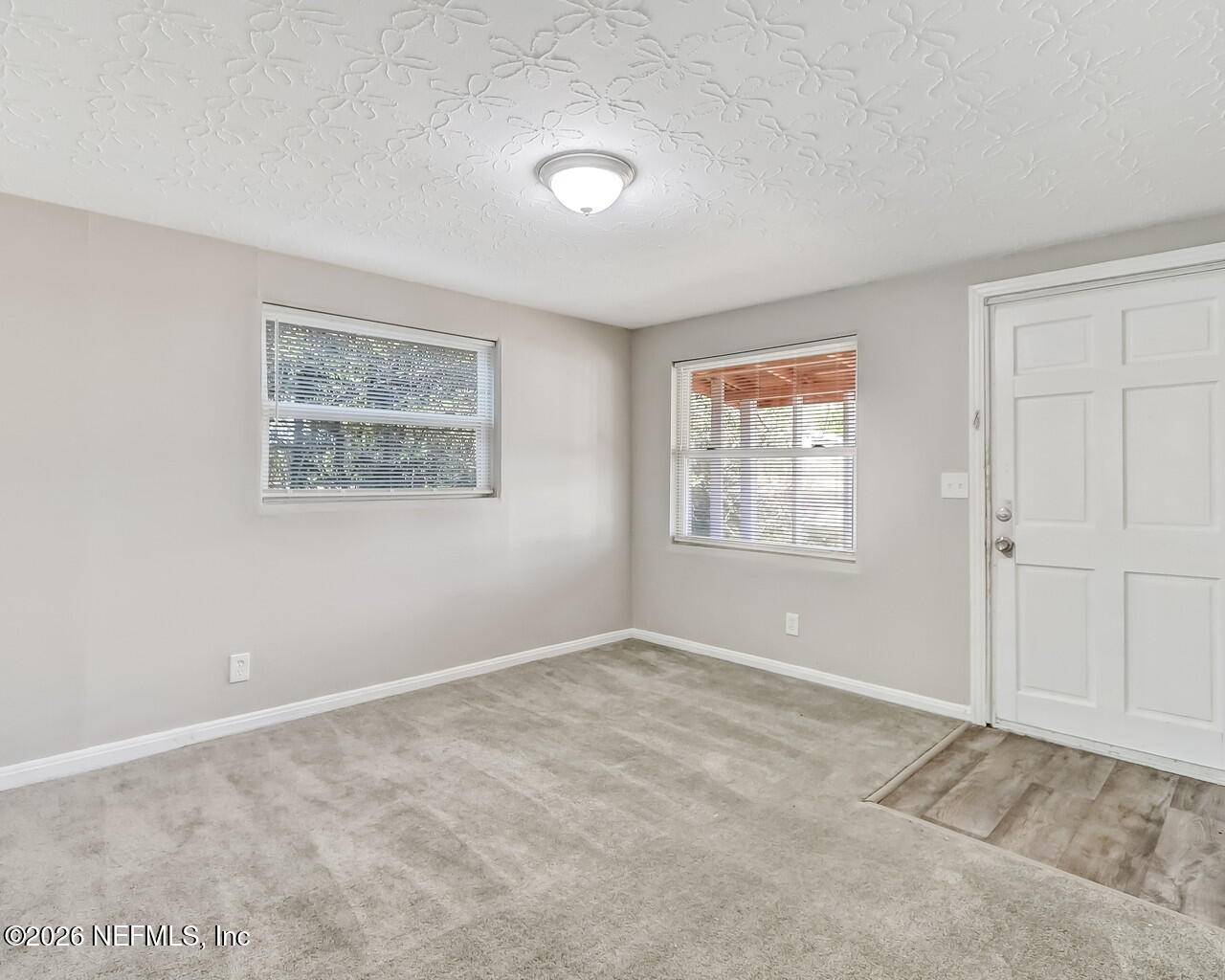 2140 Jayson Avenue Jacksonville, FL 32208 - Photo 7 of 34 a view of an empty room with a window
