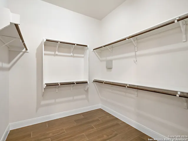 a view of an empty walk in closet