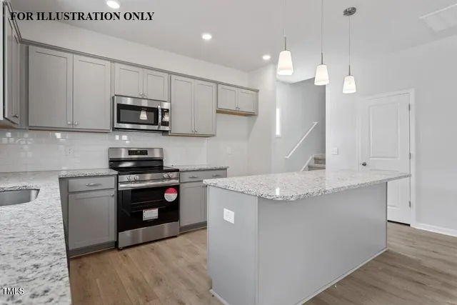 a view of kitchen and windows