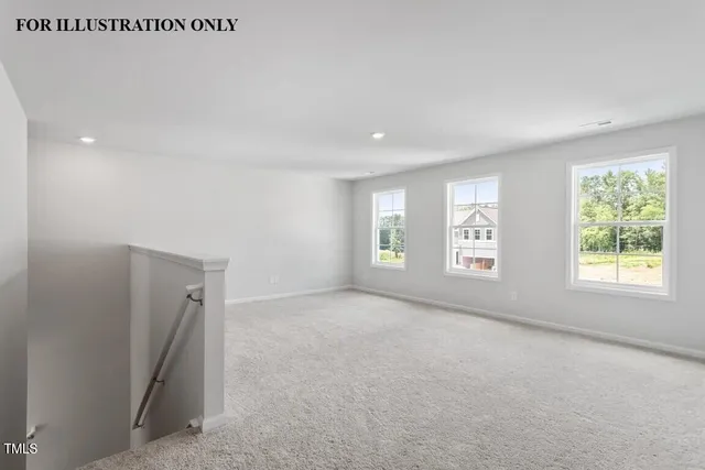 a view of a patio with wooden floor