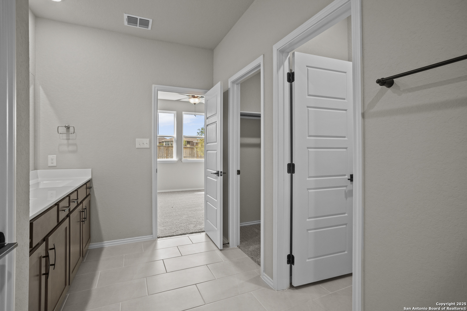 6871 Comanche Cave San Antonio, TX 78233 - Photo 23 of 41 a bathroom with a shower and a sink