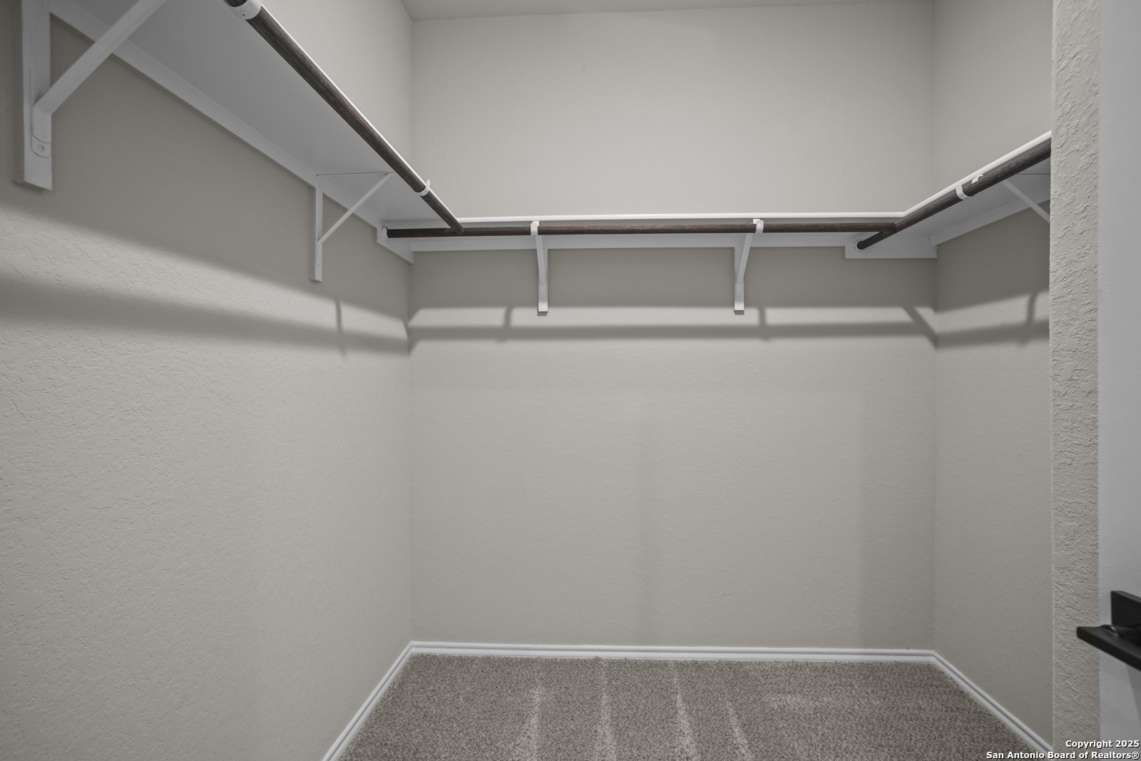 6871 Comanche Cave San Antonio, TX 78233 - Photo 25 of 41 a view of walk in closet