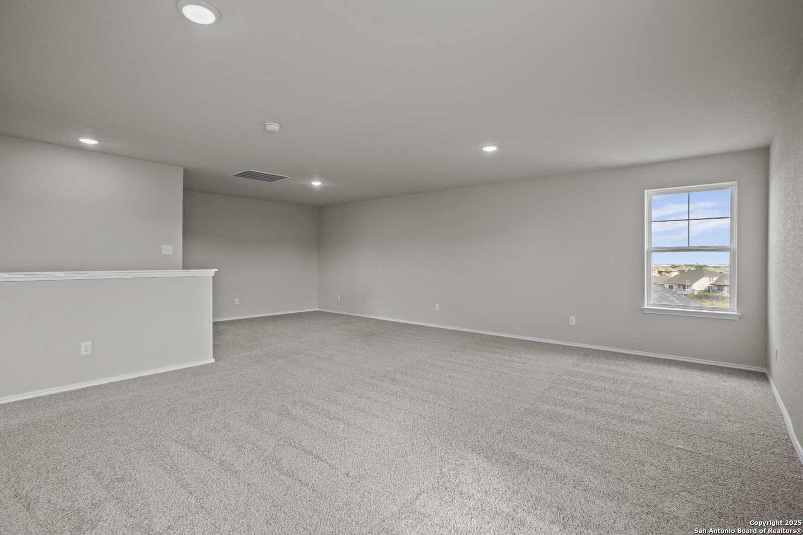 6871 Comanche Cave San Antonio, TX 78233 - Photo 28 of 41 a view of an empty room with a window