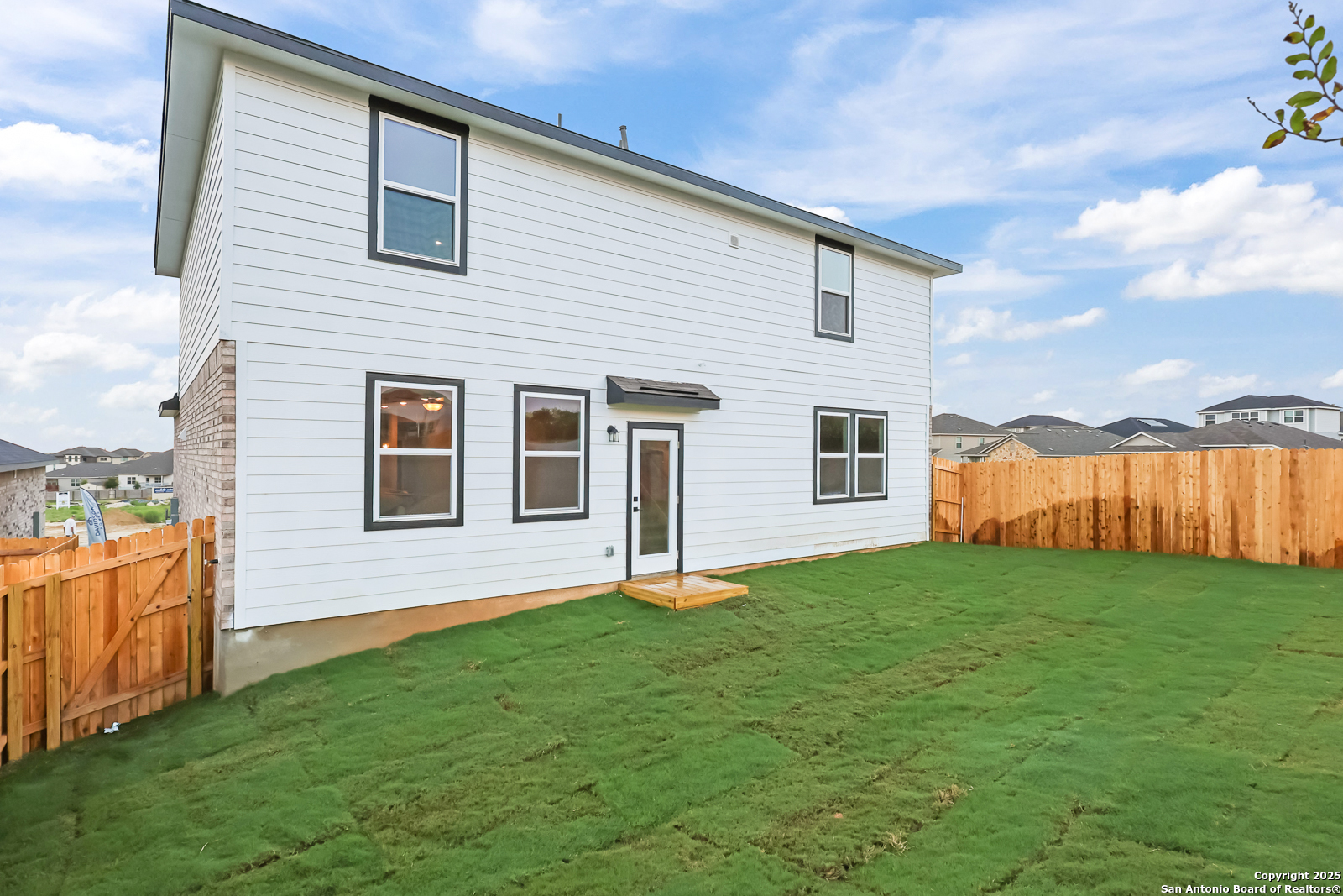 6871 Comanche Cave San Antonio, TX 78233 - Photo 35 of 41 a backyard of a house with barbeque oven