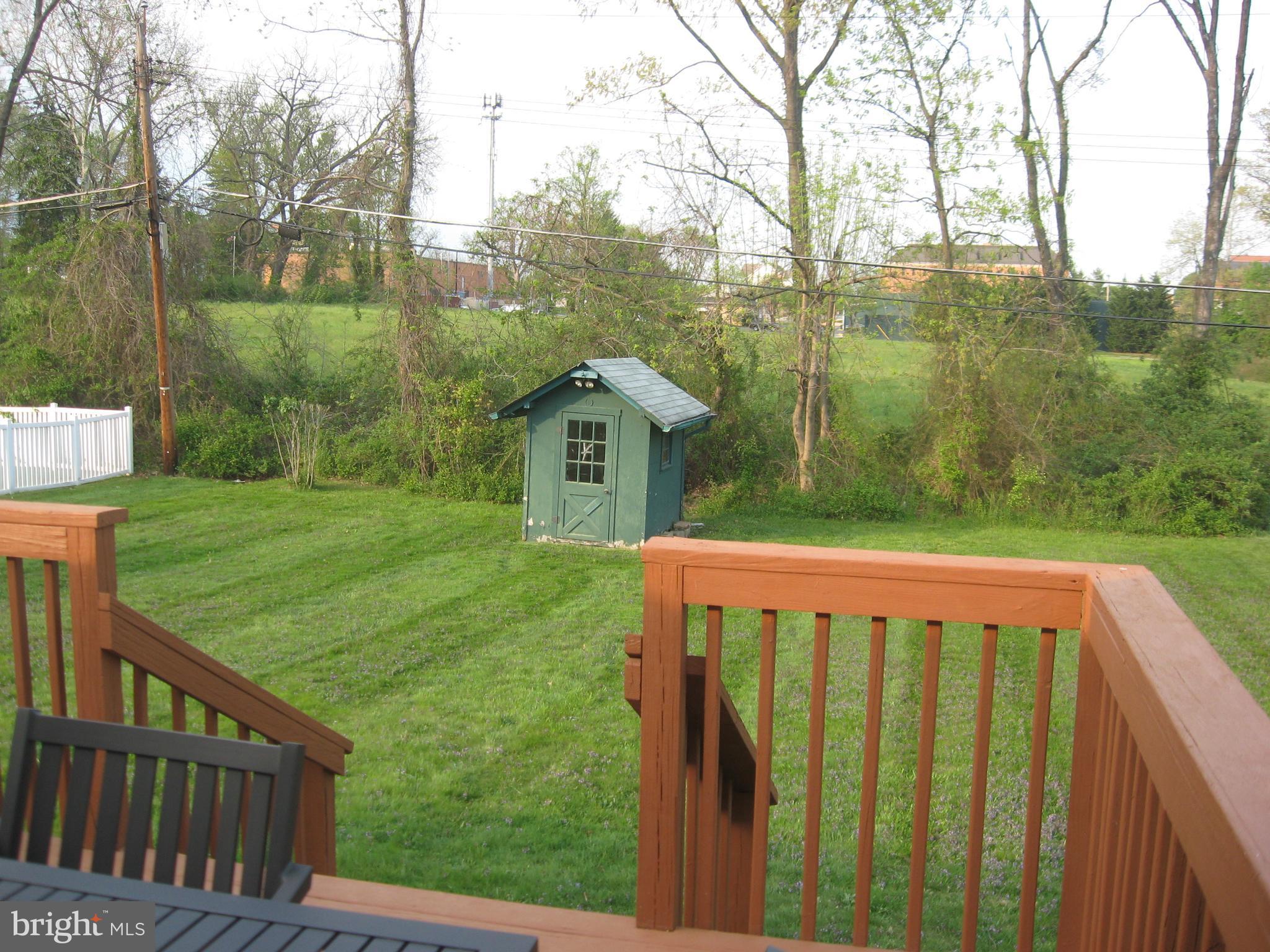 7 Brooks Road Bel Air, MD 21014 - Photo 7 of 30 Deck overlooks the level .21 acre lot w//shed.