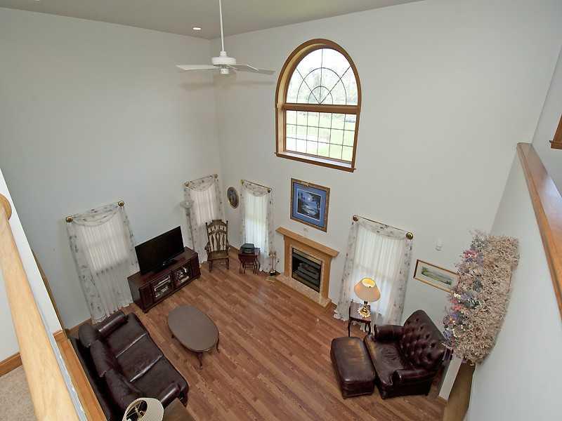 650 Allison Hollow Road Houston, PA 15342 - Photo 11 of 24 Family Room. Family Room with Red Oak Laminate Wood Floor