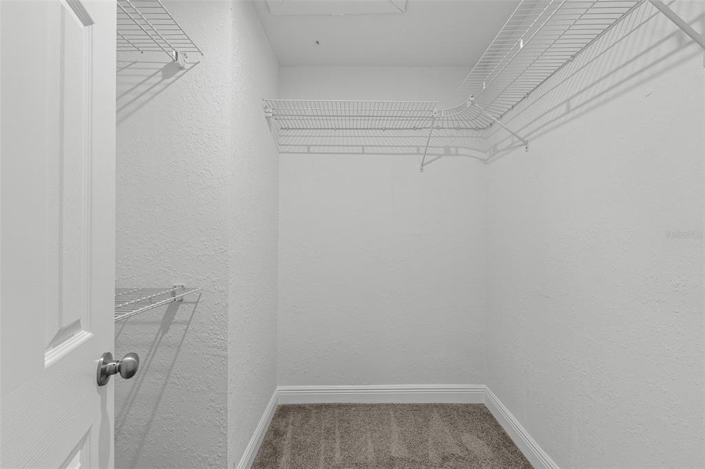 606 Bama Road Brandon, FL 33511 - Photo 27 of 44 a view of a room with racks on the wall