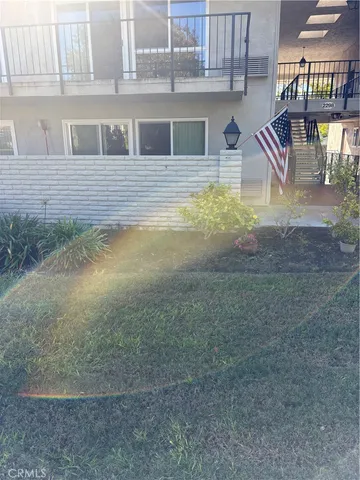 a view of house with outdoor space