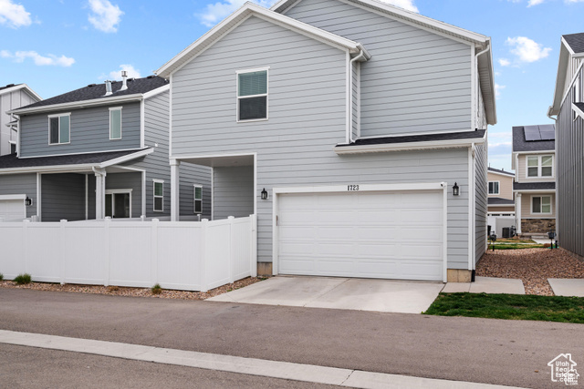 1723 North 1260th Street East Payson, UT 84651 - Photo 1 of 1 View of front of property with an attached garage and concrete driveway