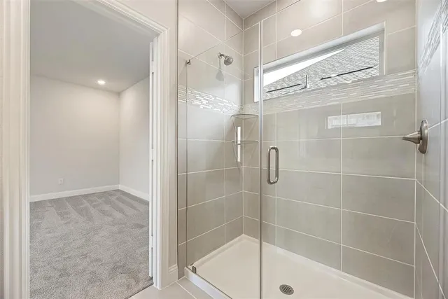 a view of an empty room with windows