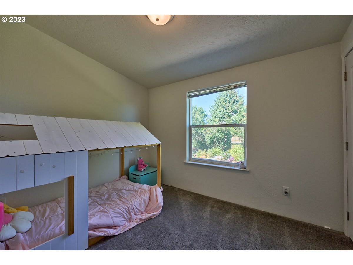81481 Valley View Road Joseph, OR 97846 - Photo 16 of 24 a bedroom with furniture and a window