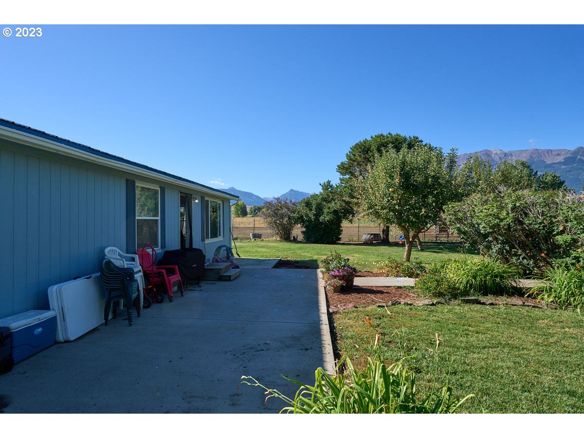 81481 Valley View Road Joseph, OR 97846 - Photo 7 of 24 a view of a house with backyard porch and sitting area