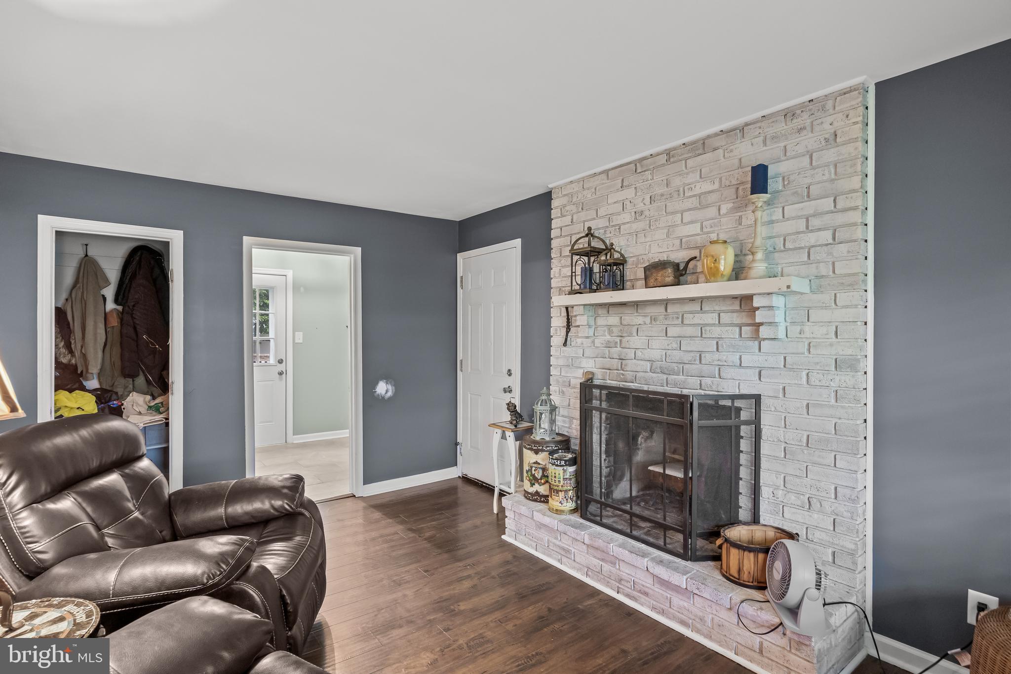 235 Waterford-Blue Anchor Road Hammonton, NJ 08037 - Photo 15 of 29 a living room with furniture and a fireplace