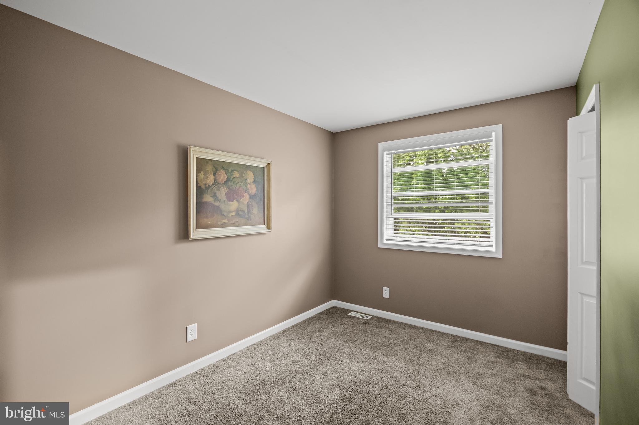 235 Waterford-Blue Anchor Road Hammonton, NJ 08037 - Photo 21 of 29 a view of an empty room with a window