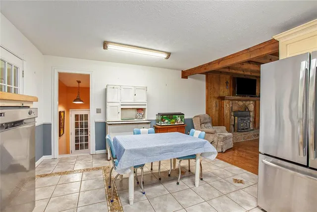 a bathroom with a sink mirror vanity and toilet