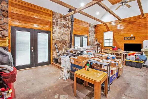 a view of a yard with large trees