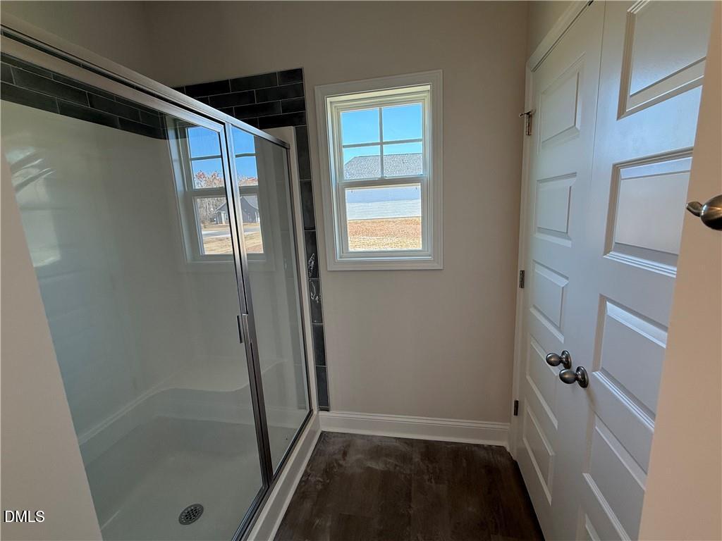 244 Godwin Gate Street, Unit 56 Linden, NC 28356 - Photo 11 of 21 a view of room with window and shower
