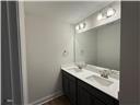244 Godwin Gate Street, Unit 56 Linden, NC 28356 - Photo 15 of 21 a bathroom with a sink and a mirror