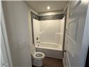 244 Godwin Gate Street, Unit 56 Linden, NC 28356 - Photo 16 of 21 a bathroom with a shower and a toilet