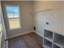 244 Godwin Gate Street, Unit 56 Linden, NC 28356 - Photo 7 of 21 an empty room with a window