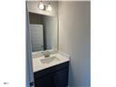 244 Godwin Gate Street, Unit 56 Linden, NC 28356 - Photo 8 of 21 a bathroom with a sink and a mirror