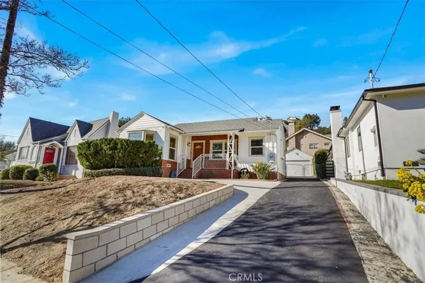a view of a house with roof deck