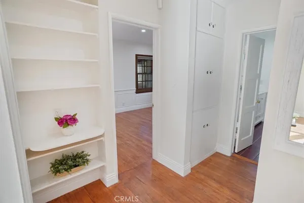 an entryway at livingroom with furniture and wooden floor