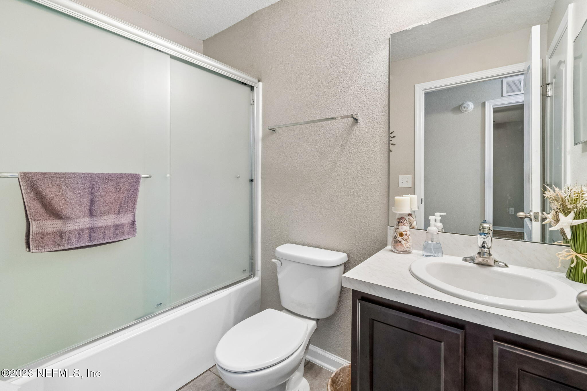 2113 Golden Lake Loop St. Augustine, FL 32084 - Photo 28 of 50 a bathroom with a sink a toilet and vanity