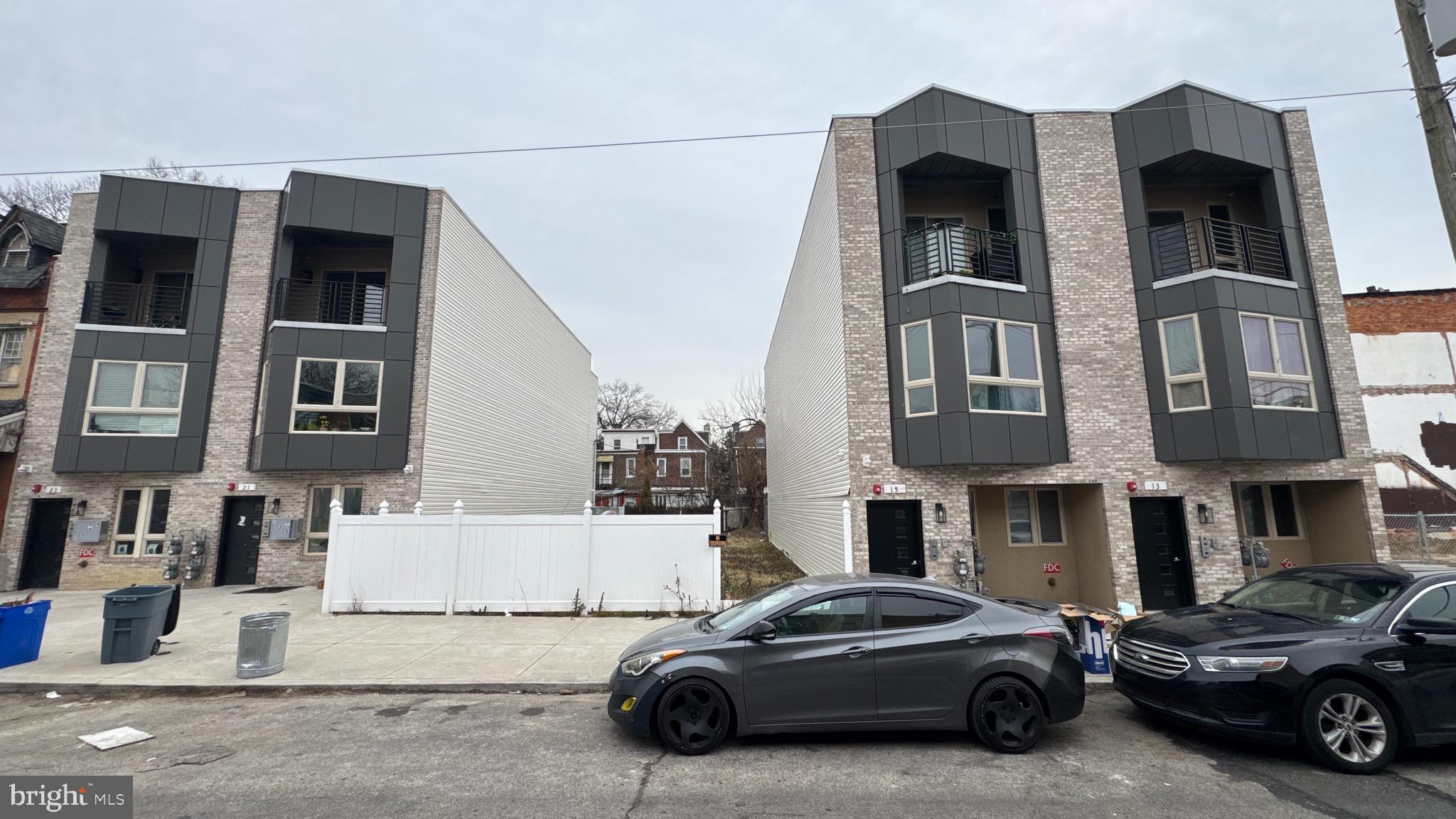 a view of a car parked in front of a building