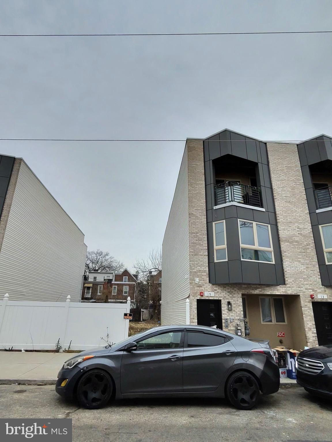 17 Farson Street Philadelphia, PA 19139 - Photo 2 of 6 a view of a car parked in front of a house