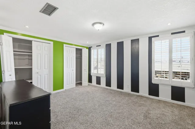 a view of a kitchen with furniture and a kitchen