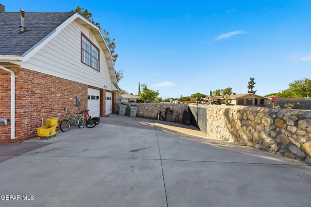 a view of a street with couches