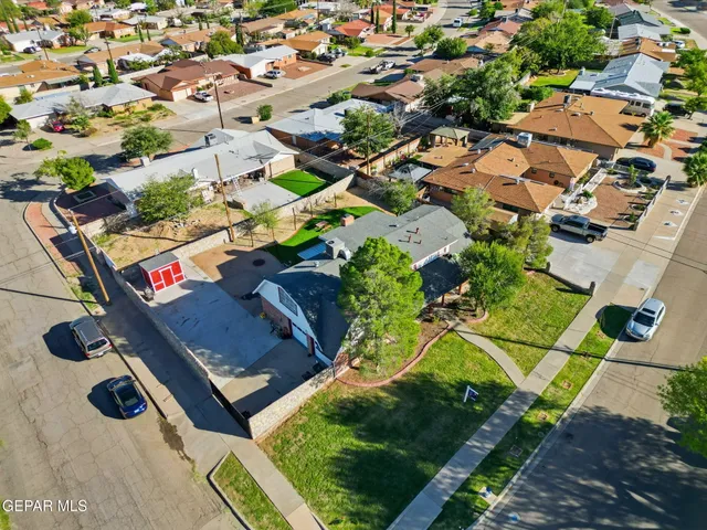 an aerial view of residential house with outdoor space