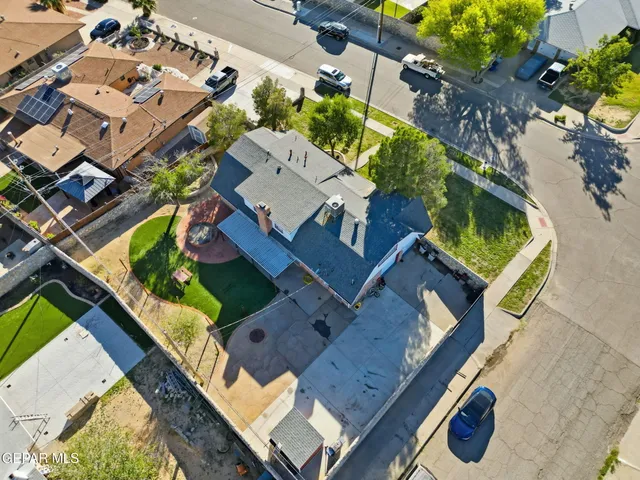 an aerial view of a house with a garden