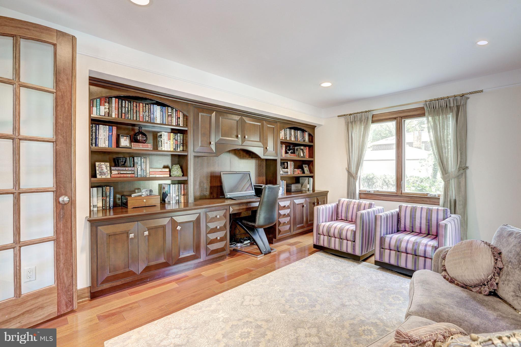 10101 Ormond Road Potomac, MD 20854 - Photo 5 of 30 a livingroom with workspace and a window