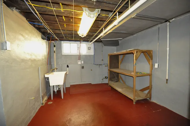 a bathroom with a toilet and a sink