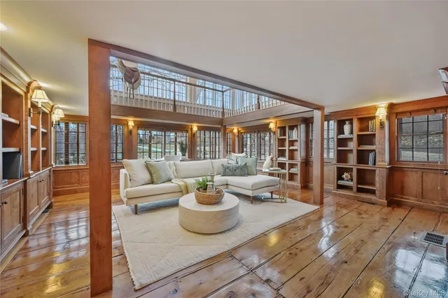 a view of a porch with wooden floor