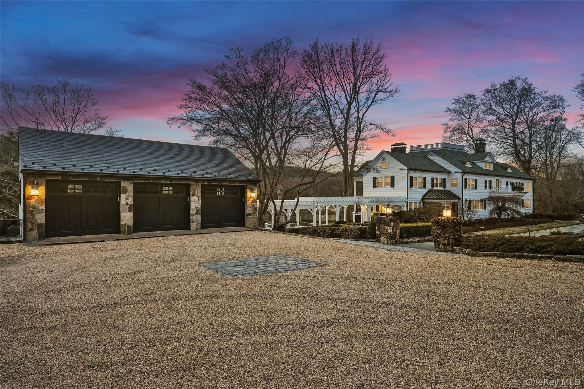 151-155 Long Ridge Road Danbury, CT 06810 - Photo 2 of 48 a front view of a building with a yard and garage